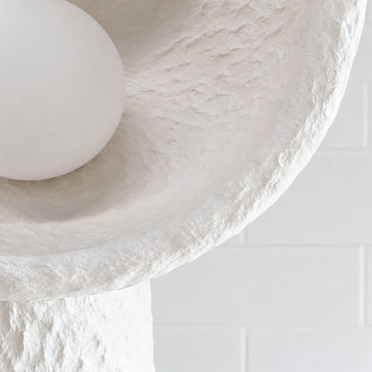 Detail of the tactile matte white resin finish of the Totem sculptural floor lamp