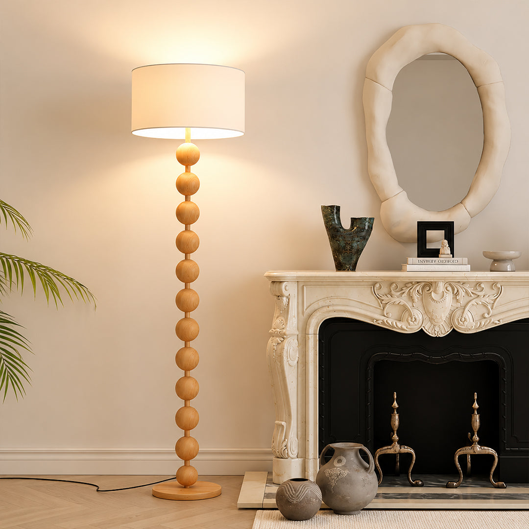 Tronco floor lamp modern living room TV lounge coffee table beside walnut nature wood tall 63 inch statement natural wood white fabric shade Scandinavian warm ambient relaxed evening lifestyle interior American home