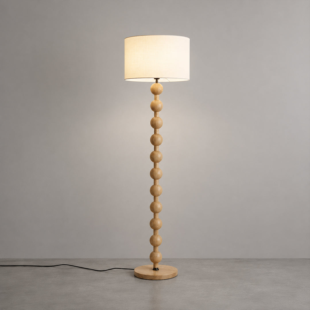 Tronco floor lamp nature wood white fabric shade barbell shape tall 63 inch solid natural handcrafted modern Japandi Scandinavian living room reading white background
