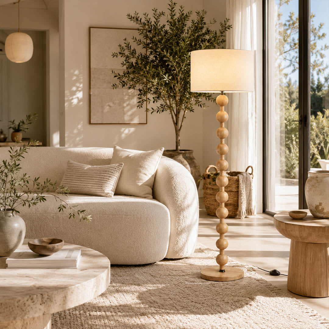 Tronco floor lamp walnut wood modern library reading corner nook armchair beside accent tall 63 inch statement natural wood white fabric shade Japandi warm ambient intimate cozy focus lifestyle interior American home