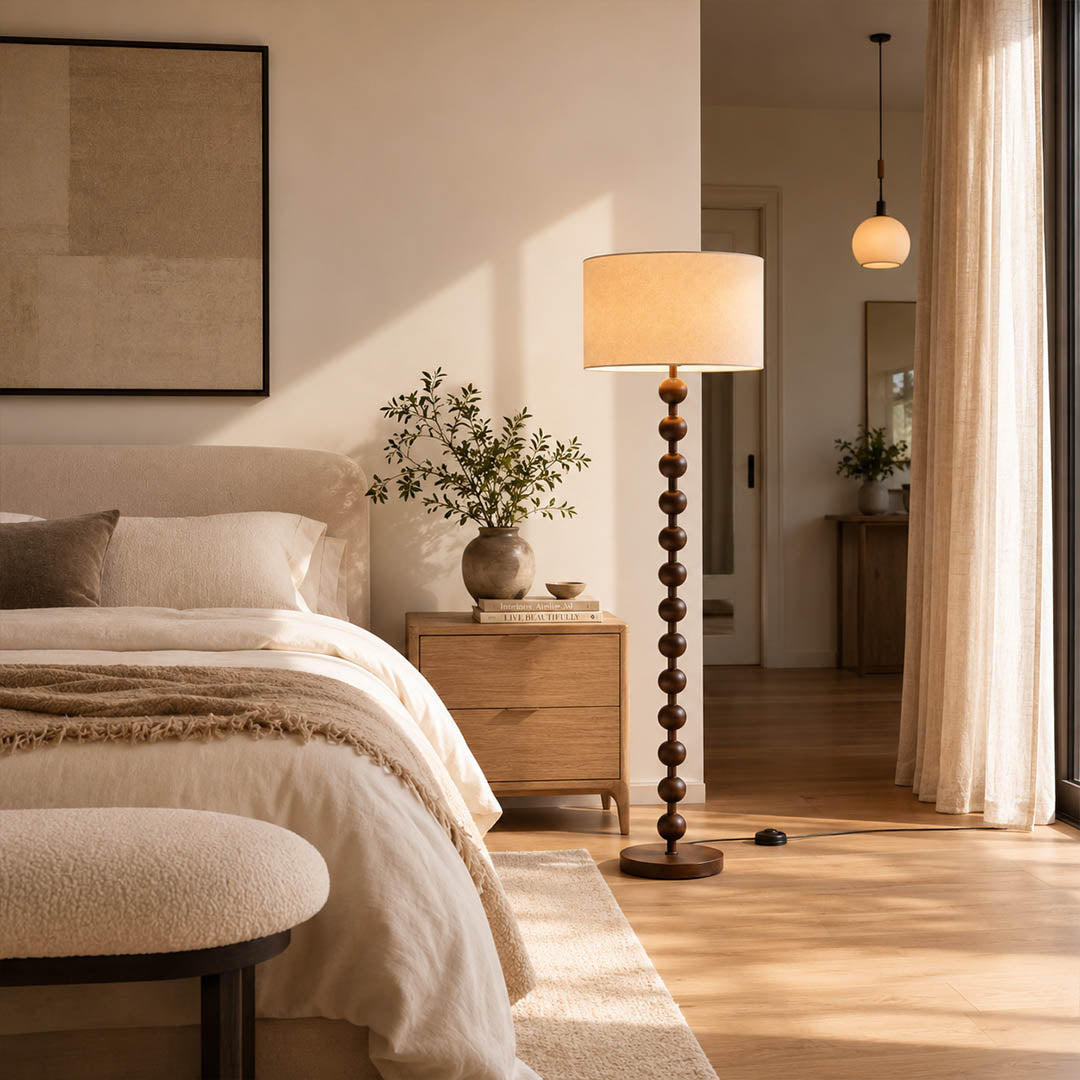 Tronco floor lamp walnut wood modern primary bedroom corner accent tall 63 inch statement natural wood white fabric shade Japandi Scandinavian warm ambient intimate romantic lifestyle interior American home