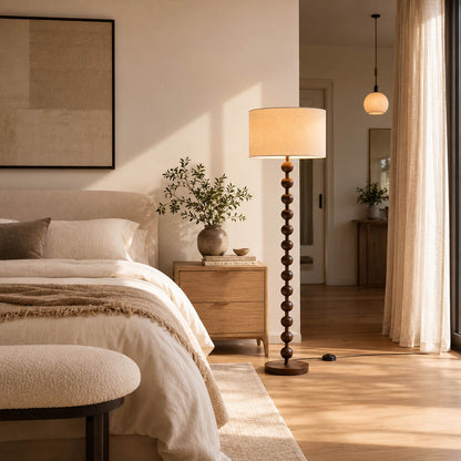 Tronco floor lamp walnut wood modern primary bedroom corner accent tall 63 inch statement natural wood white fabric shade Japandi Scandinavian warm ambient intimate romantic lifestyle interior American home