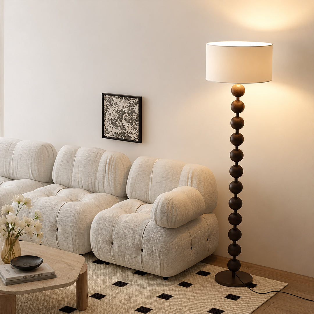 Tronco floor lamp walnut wood modern living room corner sofa side accent tall 63 inch statement natural wood white fabric shade Japandi Scandinavian warm ambient sophisticated lifestyle interior American home