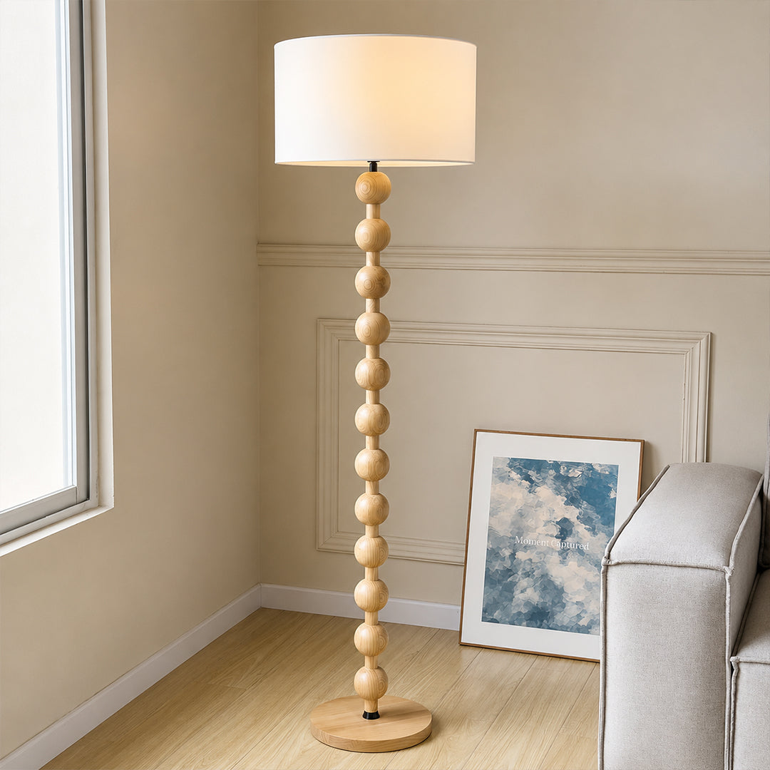 Tronco floor lamp walnut wood modern living room corner sofa side accent tall 63 inch statement natural wood white fabric shade Japandi Scandinavian warm ambient sophisticated lifestyle interior American home
