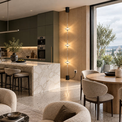 Chrome Trottola crystal star lamp in a glamorous living room with velvet seating