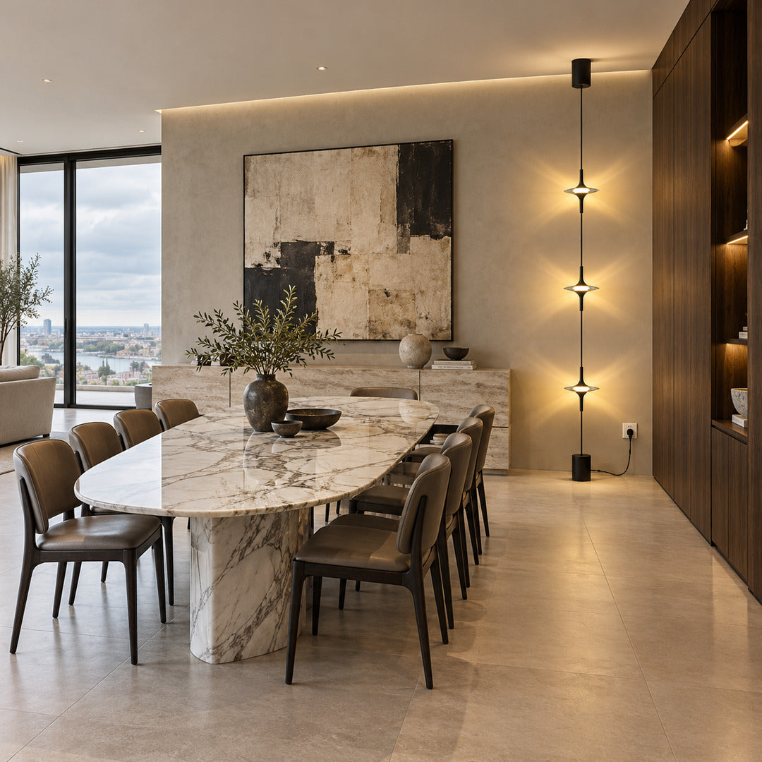 Chrome Trottola floor-to-ceiling lamp adding sparkle beside a dining room sideboard