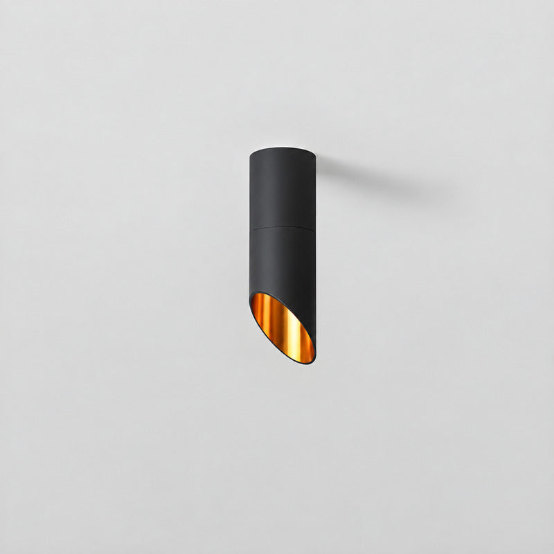 Short 9.1-inch black Tubo ceiling downlight on a low ceiling above a counter