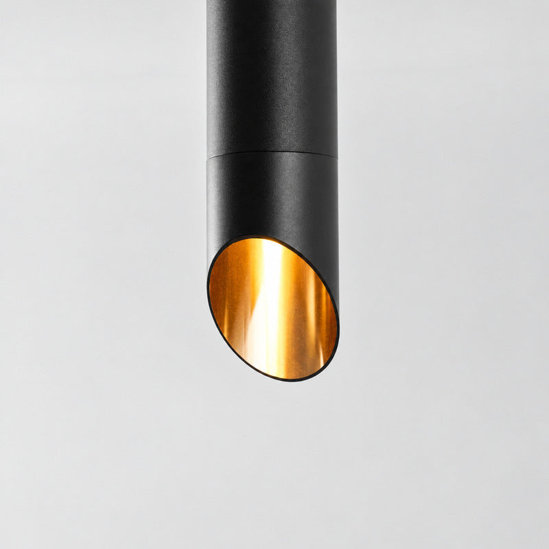 Warm focused downward beam cast by the Tubo tube ceiling downlight