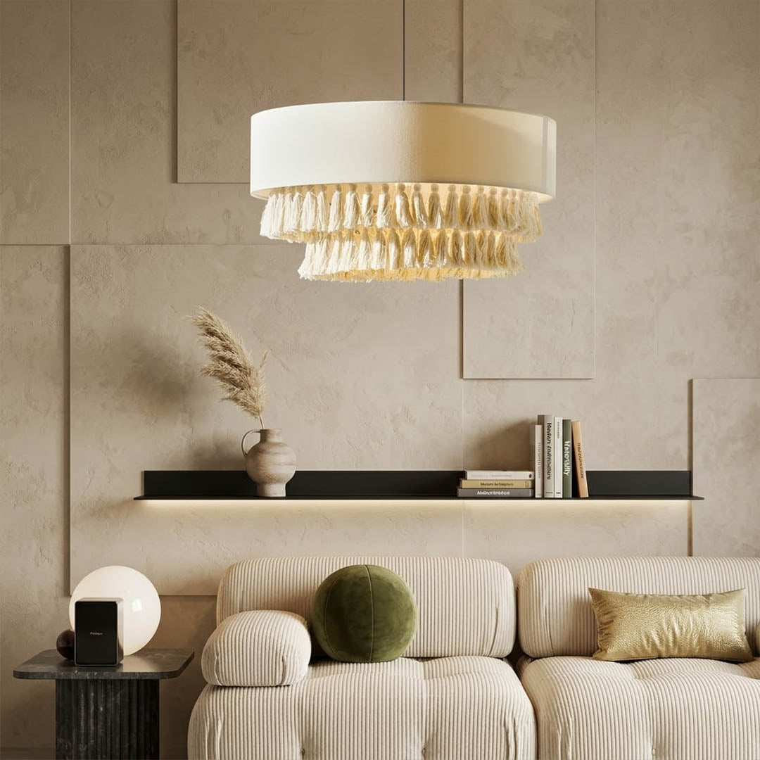 Tulum jute pendant light above bed warm sun-washed glow coastal boho bedroom interior