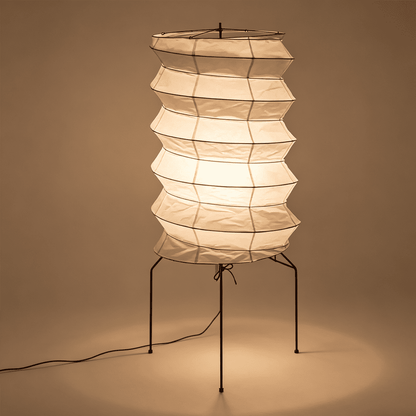 UF2-31N Washi paper table lamp with warm internal glow, handcrafted rice paper shade on black metal tripod legs.