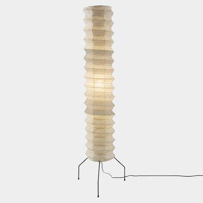UF4-31N Washi paper floor lamp, 75 inches tall, standing in a minimalist Japandi living room with warm light.