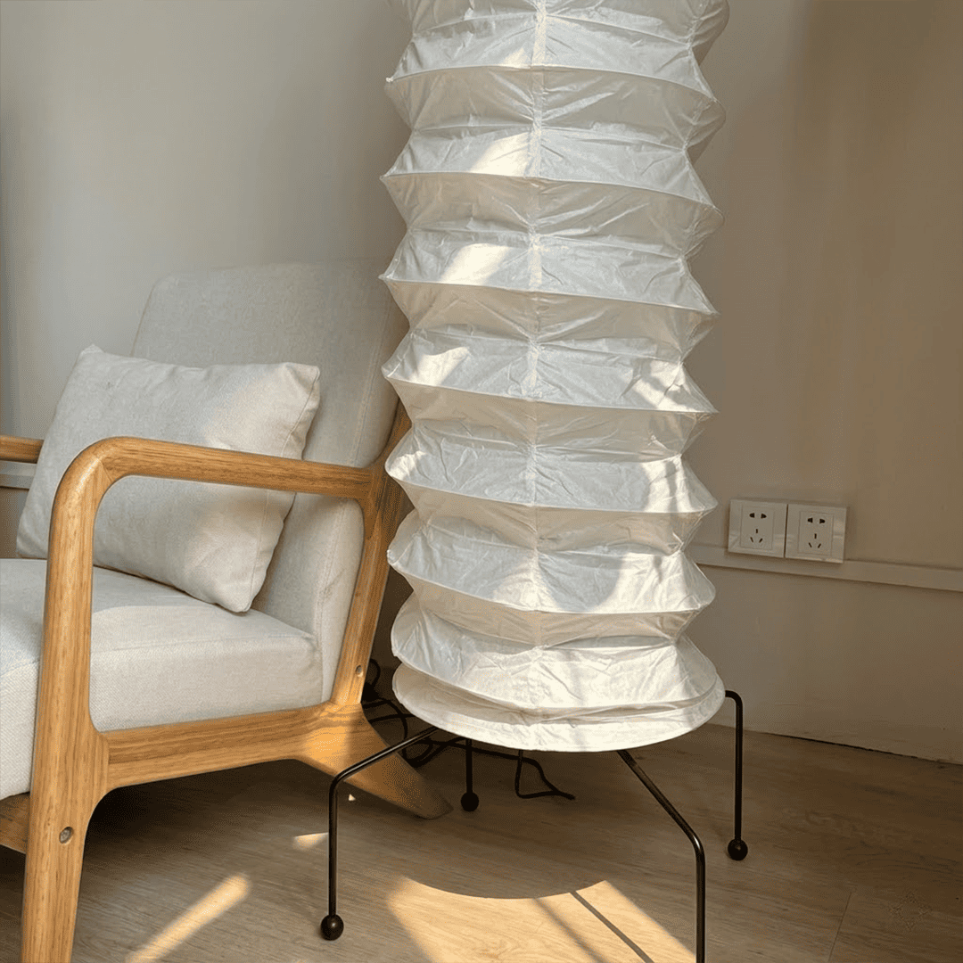 UF4-31N Washi paper floor lamp, 75 inches tall, standing in a minimalist Japandi living room with warm light.