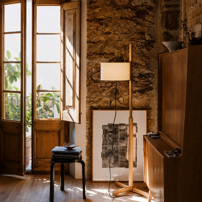 Vara floor lamp walnut wood modern entryway foyer welcome warm rich brown wooden rod beige linen drum warm ambient elegant refined lifestyle interior