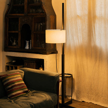 Vara floor lamp nature wood modern living room sofa side minimalist Miguel Mila inspired Scandinavian Japandi wooden rod beige linen drum warm ambient calm serene lifestyle interior