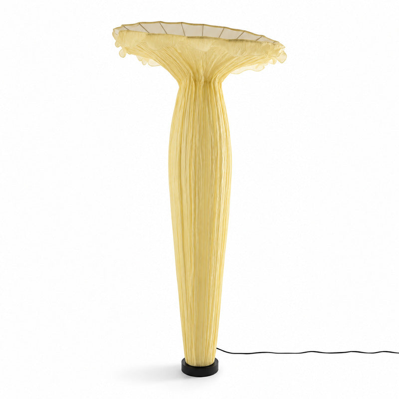 Medium 59.1-inch yellow Vaso fabric floor lamp as a warm sculptural accent in a modern room