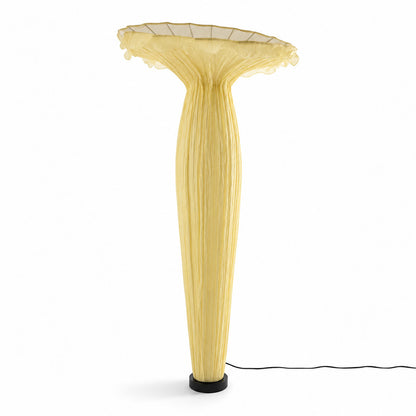 Medium 59.1-inch yellow Vaso fabric floor lamp as a warm sculptural accent in a modern room