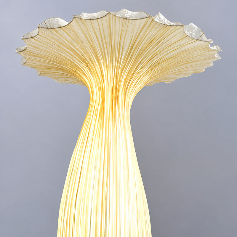 Close-up of the sculptural vase-shaped fabric shade of the Vaso floor lamp