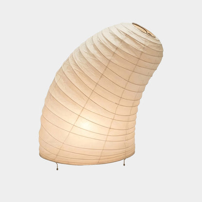 Handcrafted VB-13T Washi paper table lamp with an organic sculptural shape, emitting a warm 2700K glow in a Japandi style interior.