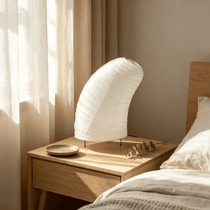 Handcrafted VB-13T Washi paper table lamp with an organic sculptural shape, emitting a warm 2700K glow in a Japandi style interior.