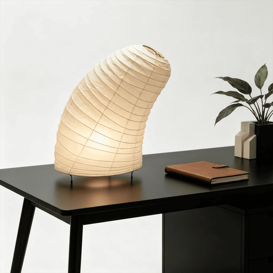Handcrafted VB-13T Washi paper table lamp with an organic sculptural shape, emitting a warm 2700K glow in a Japandi style interior.