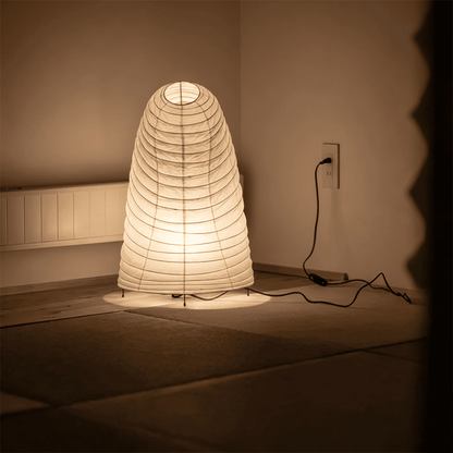 Handcrafted VB-13T Washi paper table lamp with an organic sculptural shape, emitting a warm 2700K glow in a Japandi style interior.