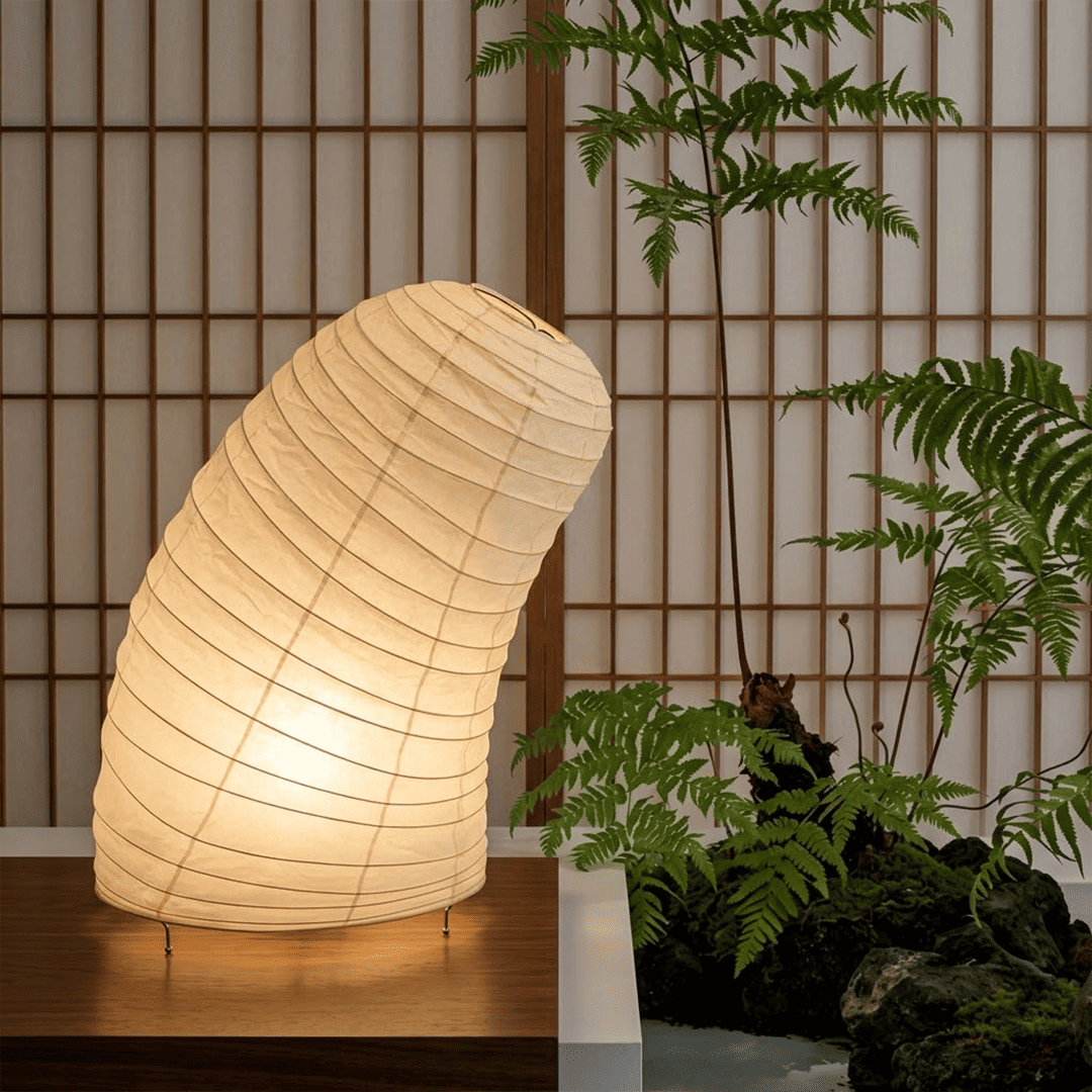 Handcrafted VB-13T Washi paper table lamp with an organic sculptural shape, emitting a warm 2700K glow in a Japandi style interior.