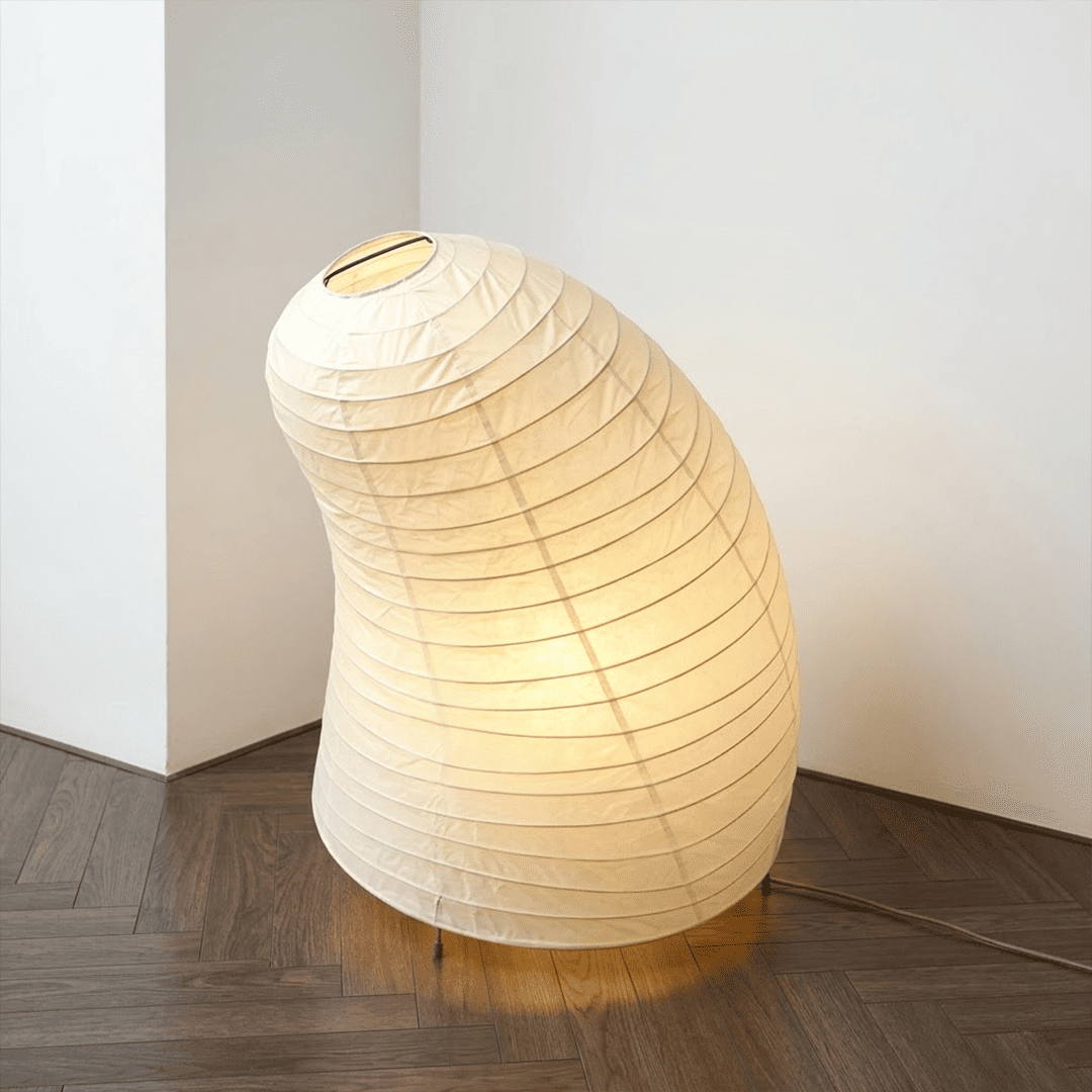 Handcrafted VB-13T Washi paper table lamp with an organic sculptural shape, emitting a warm 2700K glow in a Japandi style interior.