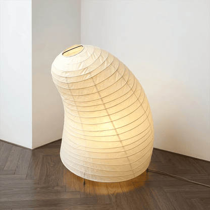 Handcrafted VB-13T Washi paper table lamp with an organic sculptural shape, emitting a warm 2700K glow in a Japandi style interior.