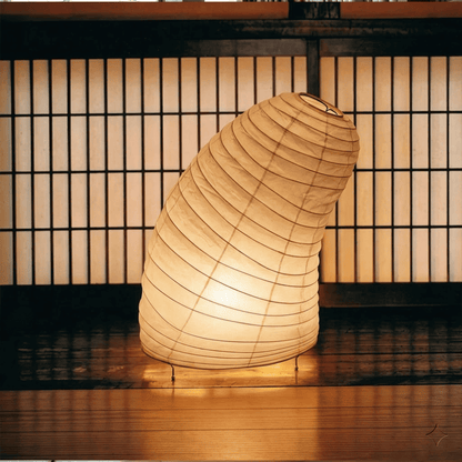 Handcrafted VB-13T Washi paper table lamp with an organic sculptural shape, emitting a warm 2700K glow in a Japandi style interior.
