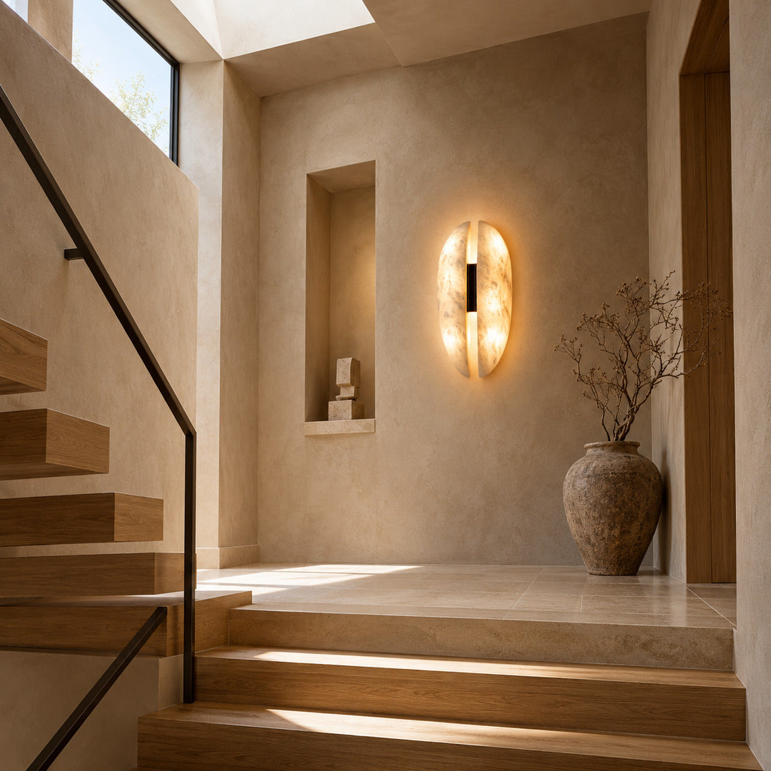 Velo alabaster wall sconces along a staircase wall