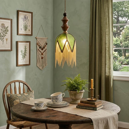 Verde green tassel pendant lights in a row above kitchen island boho interior
