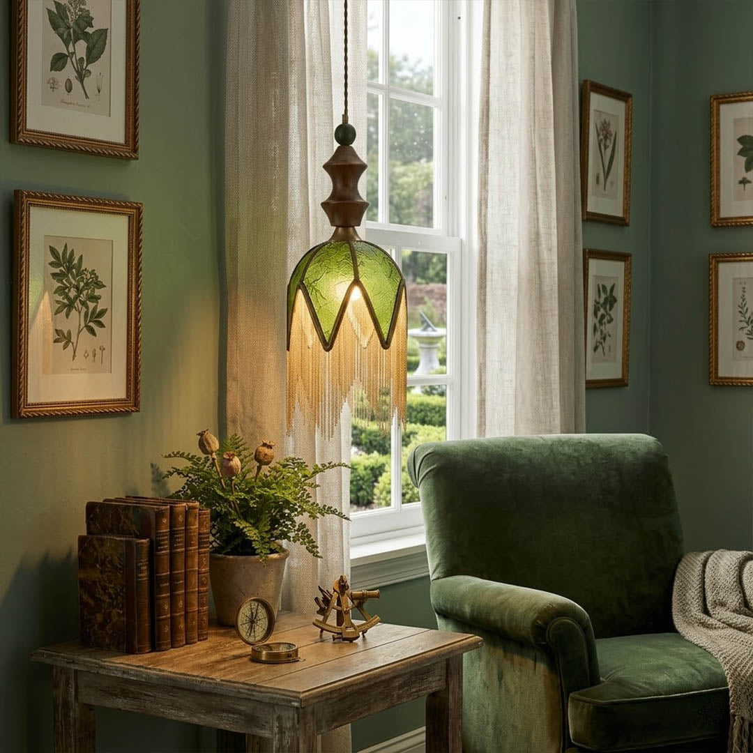 Verde green tassel pendant light beside bed warm glow boho bedroom interior with plants