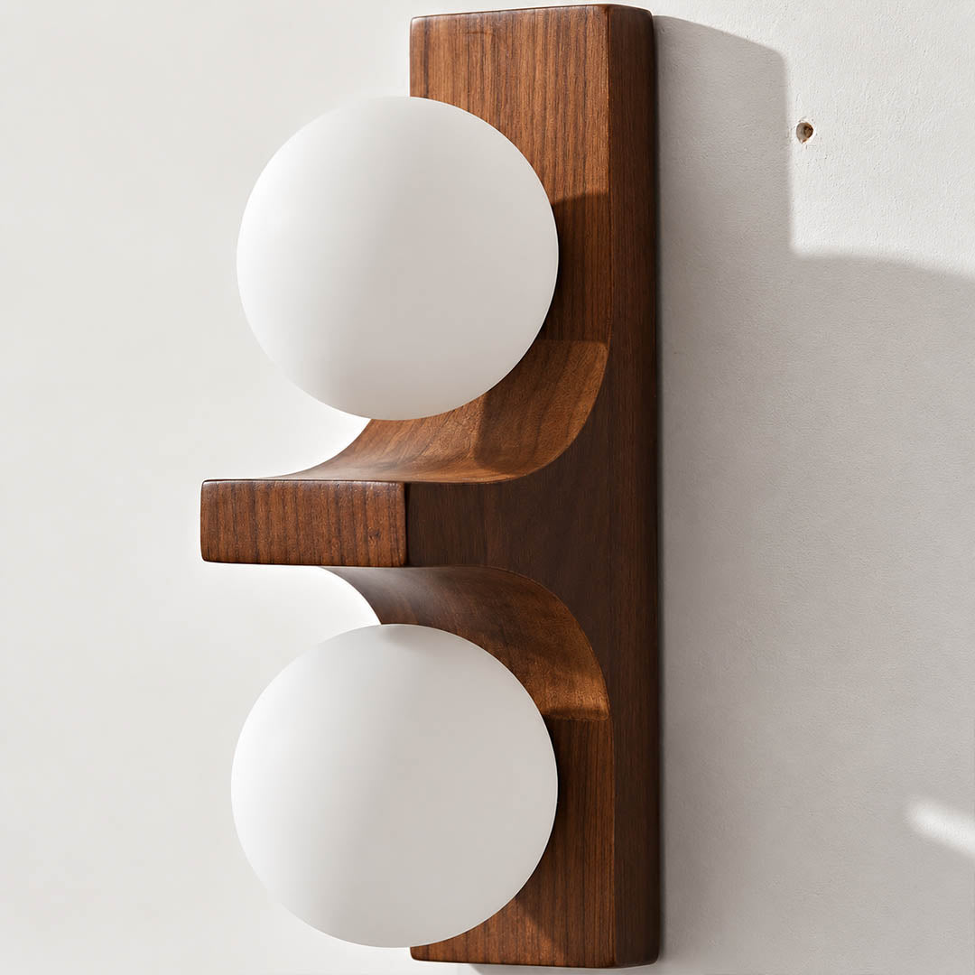 Verena double wall sconce short walnut dark wood two white glass globes compact white background front view