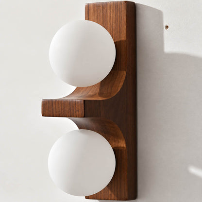 Verena double wall sconce short walnut dark wood two white glass globes compact white background front view