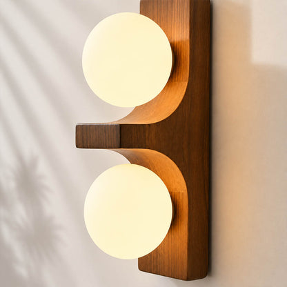 Verena double wall sconce white milky glass globe curved wood support detail close up craftsmanship