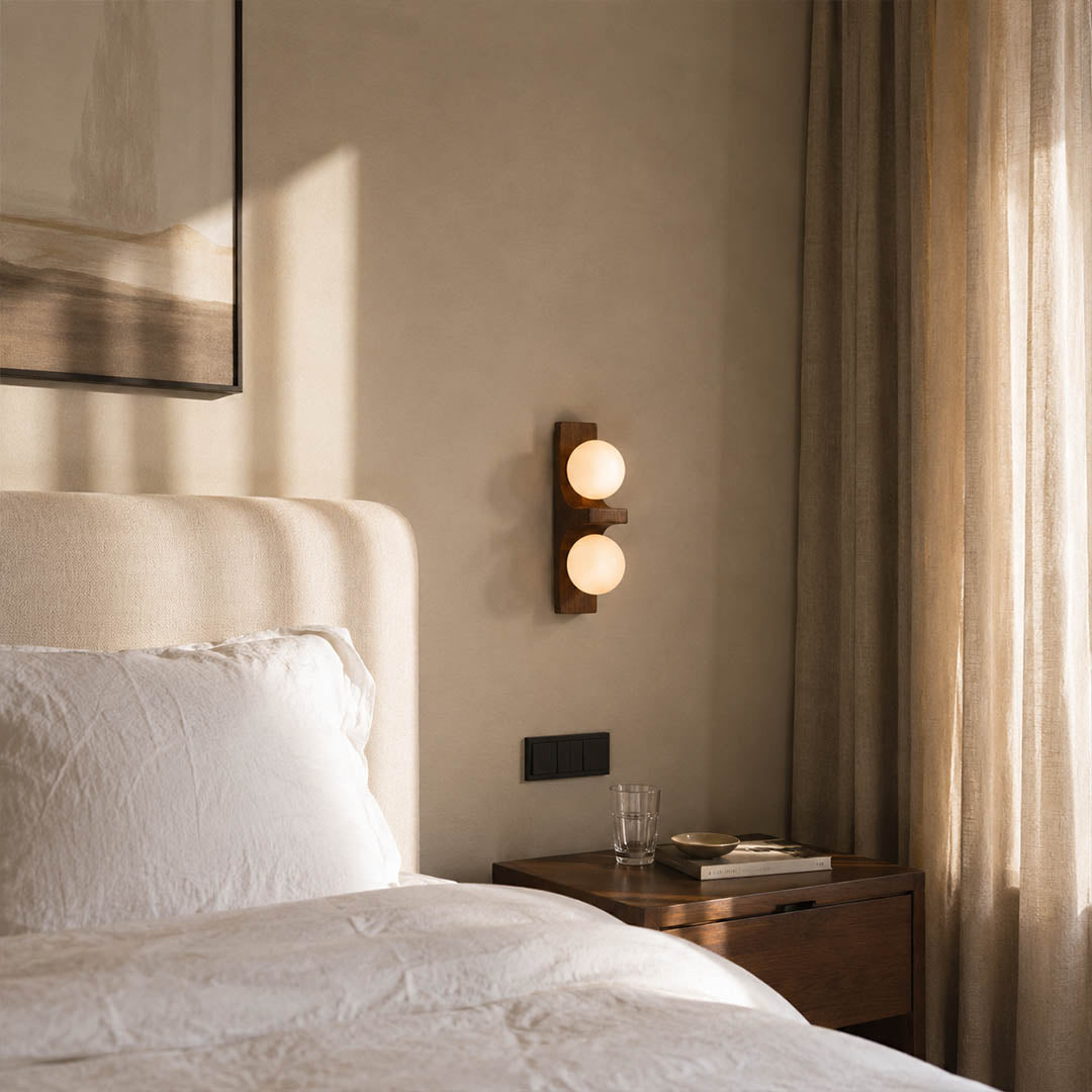 Verena double wall sconce bedroom bedside bed frame wood glass globe warm glow natural American home lifestyle interior styled