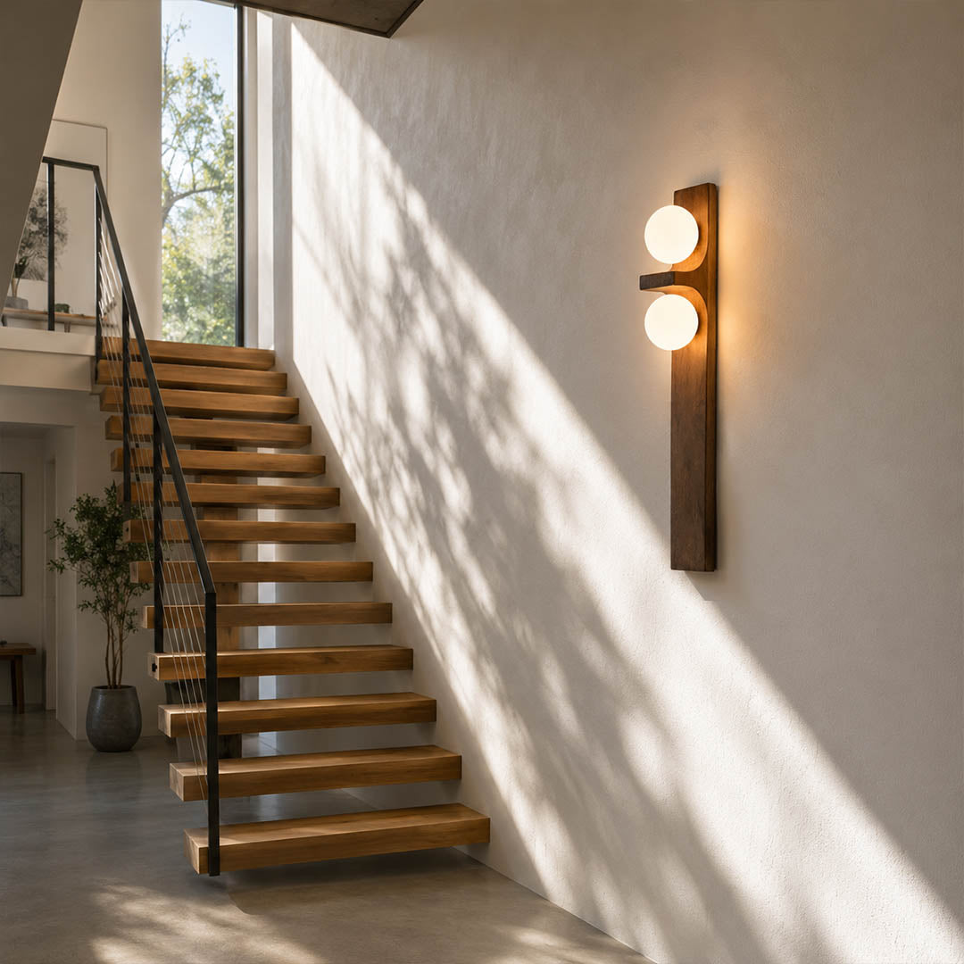 Verena double wall sconce staircase stairway wall wood glass globe warm glow vertical American home lifestyle interior styled