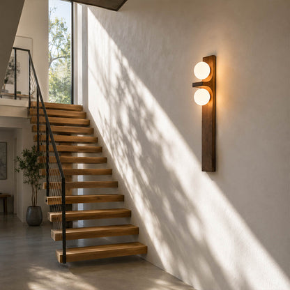 Verena double wall sconce staircase stairway wall wood glass globe warm glow vertical American home lifestyle interior styled