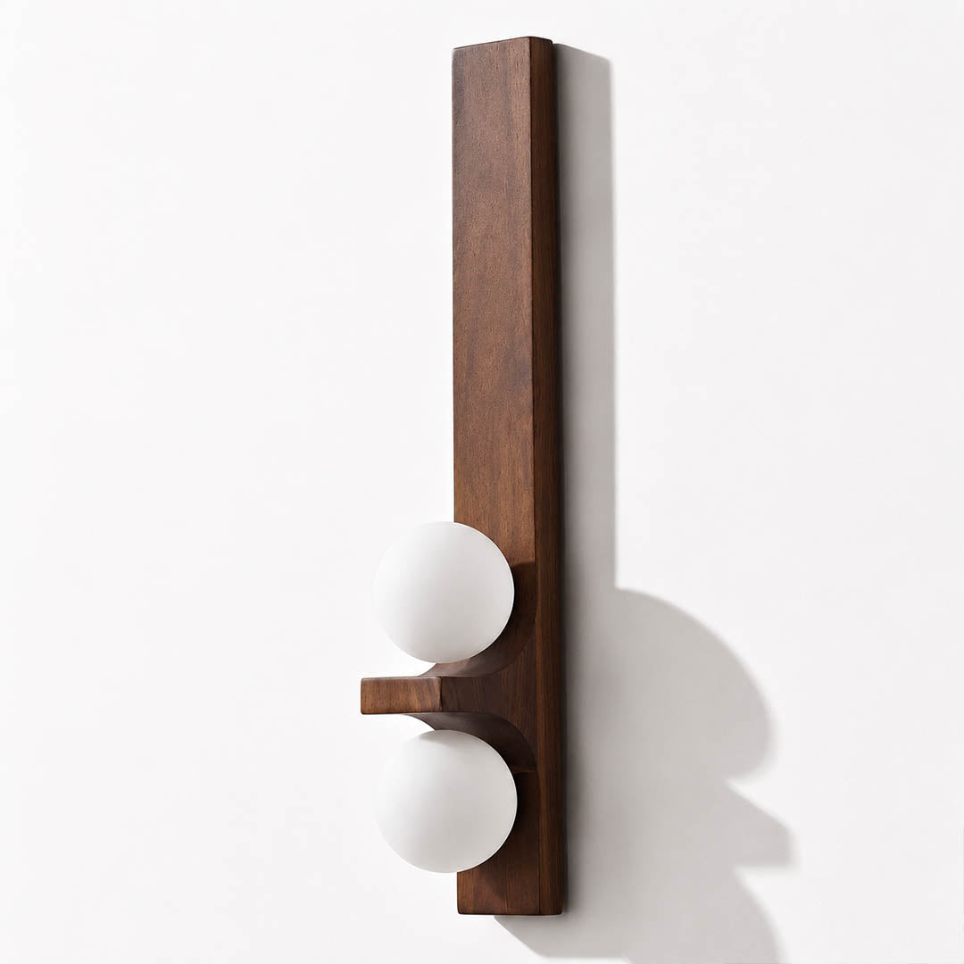 Verena double wall sconce tall walnut dark wood two white glass globes illuminated warm glow white background front view