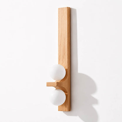 Verena double wall sconce tall oak light wood two white glass globes illuminated warm glow white background front view
