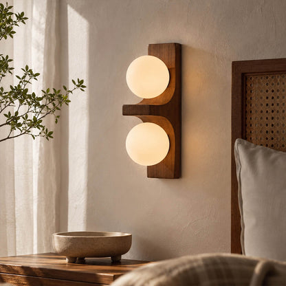 Verena double wall sconce bedroom bedside bed frame wood glass globe warm glow natural American home lifestyle interior styled