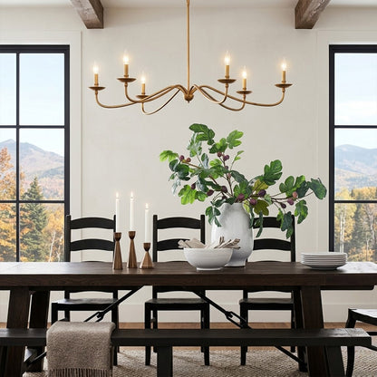 Versailles brass candle chandelier above dining table warm vintage light traditional interior