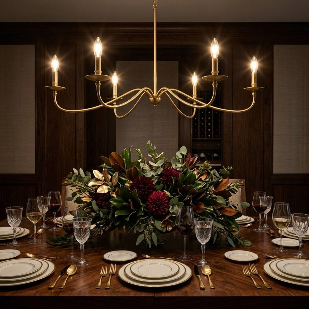 Versailles brass candle chandelier above dining table warm vintage light traditional interior