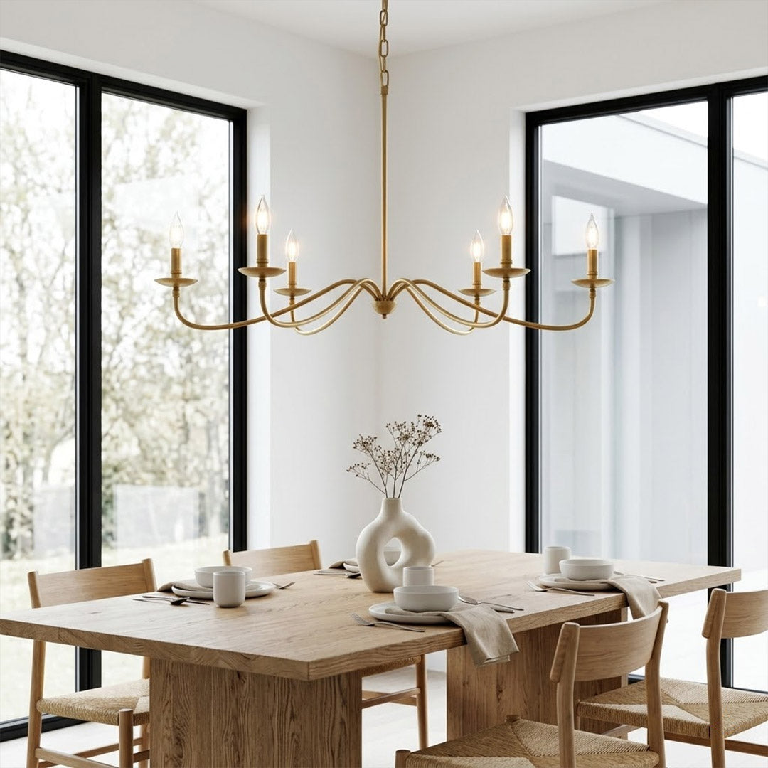 Versailles brass candle chandelier above dining table warm vintage light traditional interior