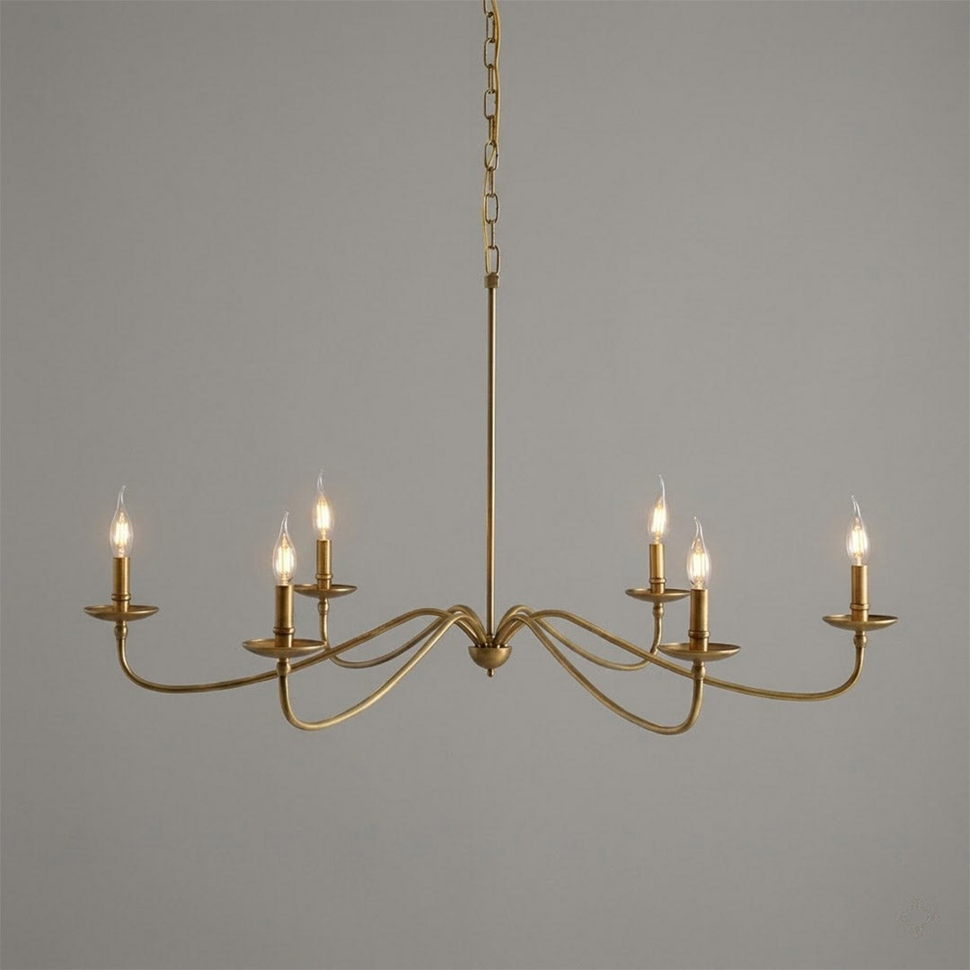 Versailles brass candle chandelier above dining table warm vintage light traditional interior