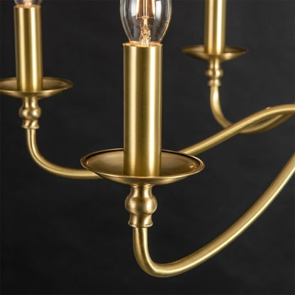 Versailles brass candle chandelier above dining table warm vintage light traditional interior