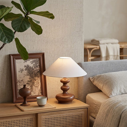 Vienne French vintage table lamp on nightstand bedroom warm fabric shade glow lifestyle interior