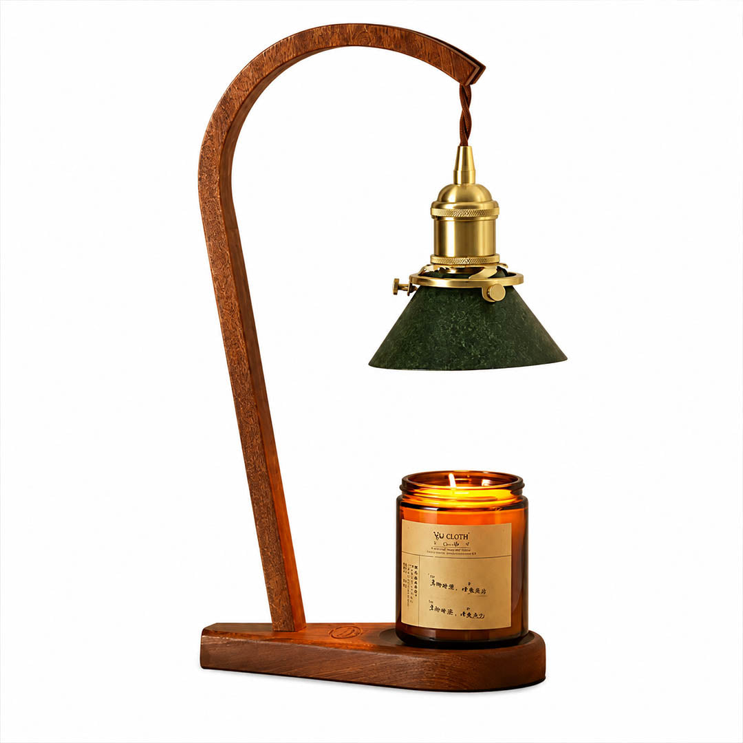 Vireo candle warmer lamp illuminated warm glow melting candle wax from above flame free white background