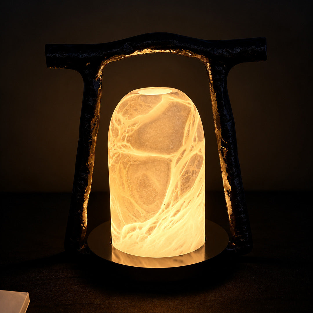 Volta alabaster table lamp adding ambient light to a home office desk
