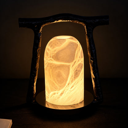 Volta alabaster table lamp adding ambient light to a home office desk